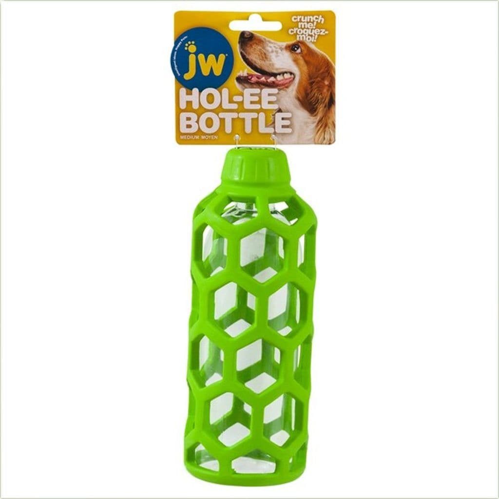 dog chewing plastic bottle