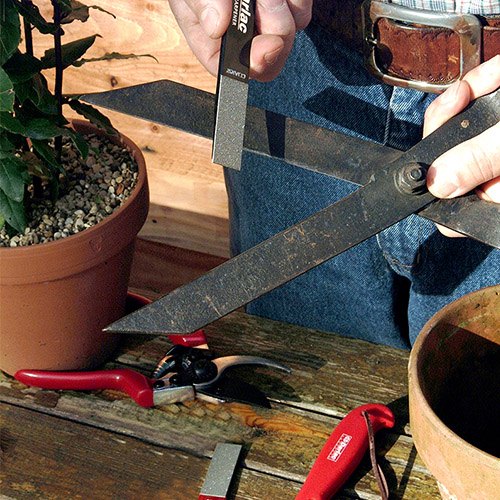 Garden tool store sharpener